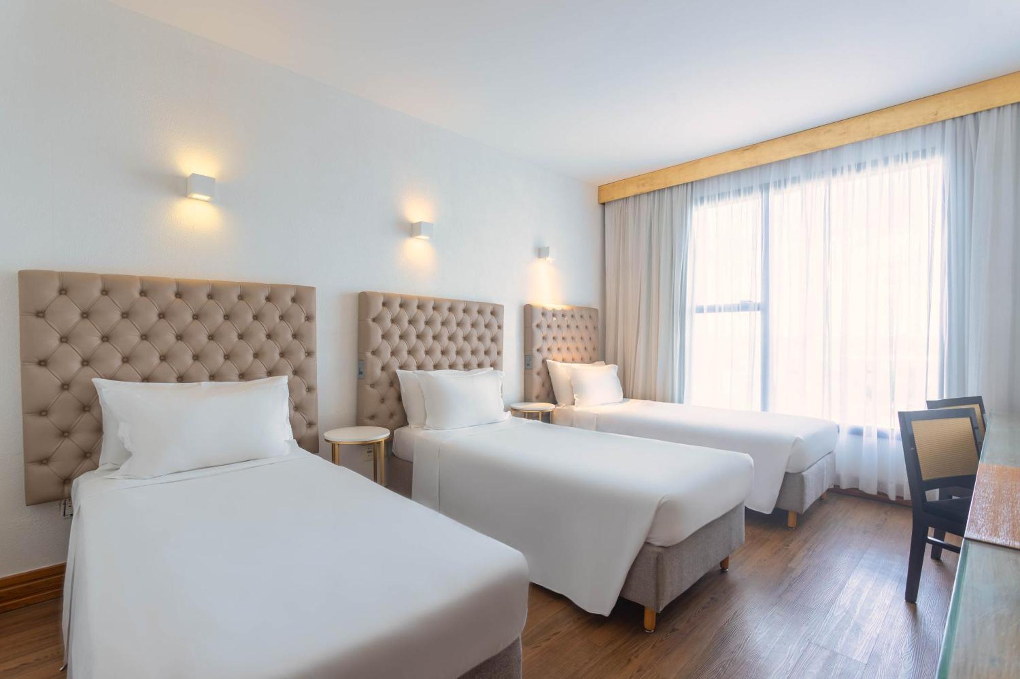 Ouro Minas Hotel Belo Horizonte, Dolce By Wyndham Exterior foto A room at the hotel