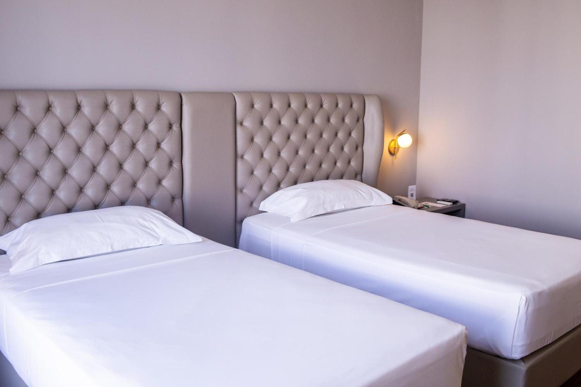 Ouro Minas Hotel Belo Horizonte, Dolce By Wyndham Exterior foto A room at the hotel
