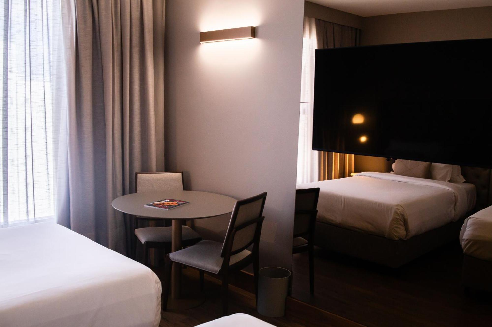Ouro Minas Hotel Belo Horizonte, Dolce By Wyndham Exterior foto A room at the hotel