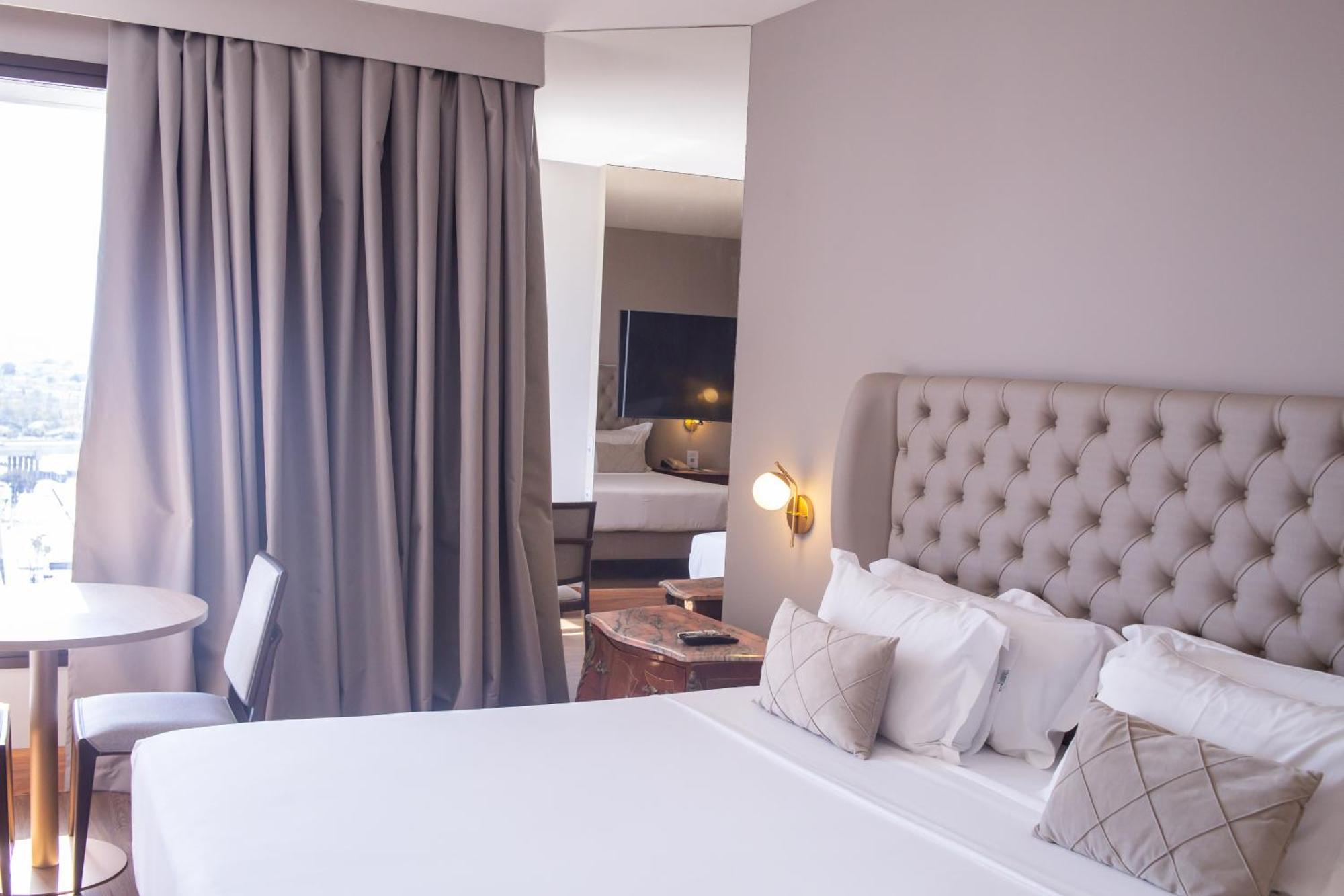 Ouro Minas Hotel Belo Horizonte, Dolce By Wyndham Exterior foto A bedroom at the hotel