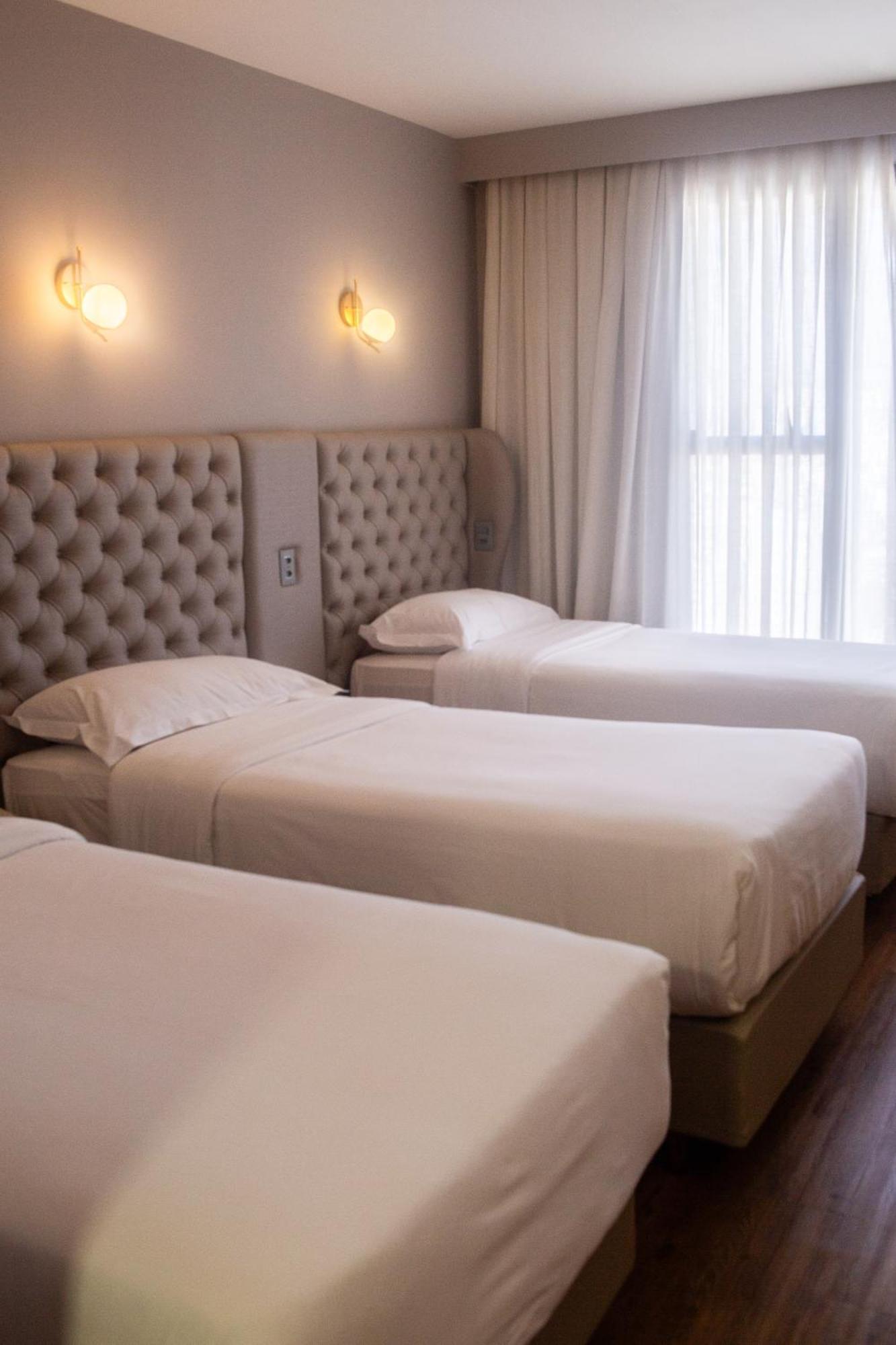 Ouro Minas Hotel Belo Horizonte, Dolce By Wyndham Exterior foto A room at the hotel